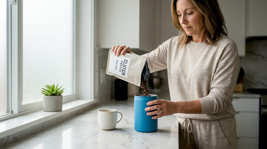 Pouring coffee beans into airtight kitchen canister